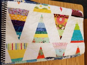 Reminds me of Renewed Jelly Roll Race Quilt