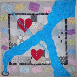 Down the Drain: basted and ready to quilt